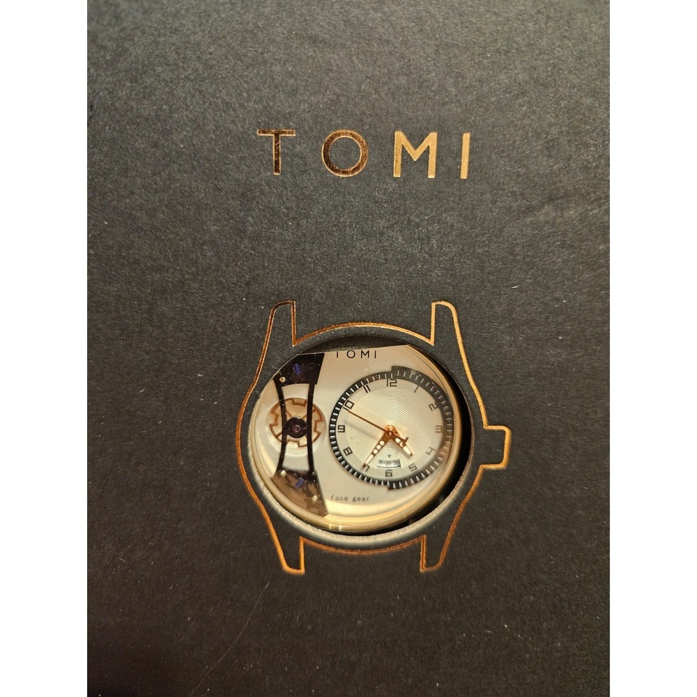 Stylish New in the box with papers Tomi Watch